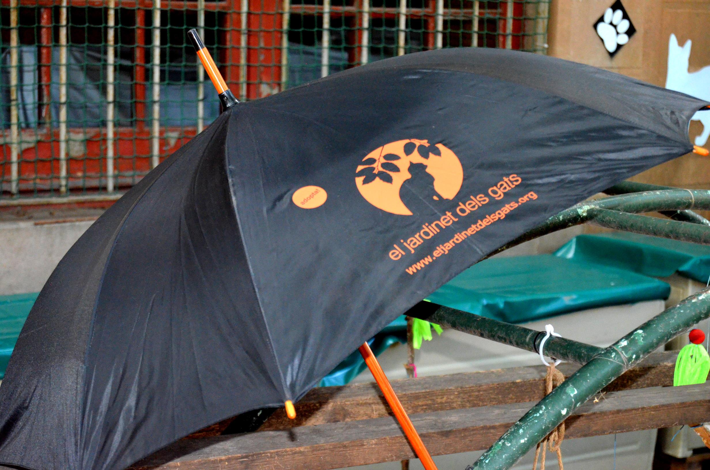 Paraigües, logo Jardinet dels gats Image